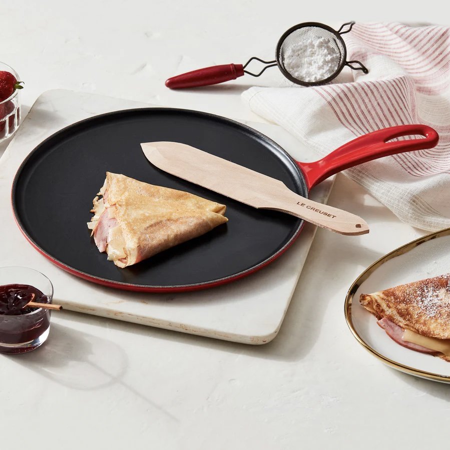 Le Creuset 27cm Crepe Pan Cast Iron Cerise (Limited Edition Eiffel Tower Vive Le France) with wooden spreader and turner